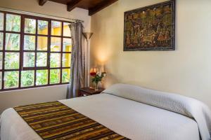 Letto o letti in una camera di Hostal Alcala