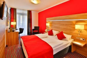 TV a/nebo společenská místnost v ubytování NP Hotel Wallis
