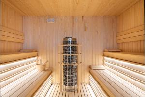 a sauna with a stack of wine bottles in it at 3HB Faro in Faro