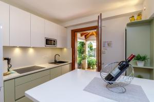 Kuchyň nebo kuchyňský kout v ubytování Apartments Lavizatic