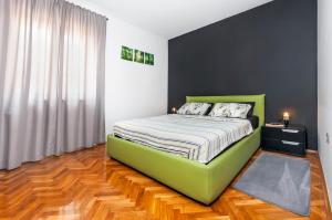 Posteľ alebo postele v izbe v ubytovaní Apartment Cave