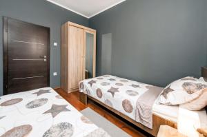 Posteľ alebo postele v izbe v ubytovaní Apartment Cave