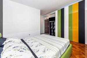 Posteľ alebo postele v izbe v ubytovaní Apartment Cave