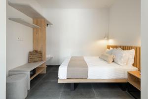 Postel nebo postele na pokoji v ubytování Yuka Villas Collection