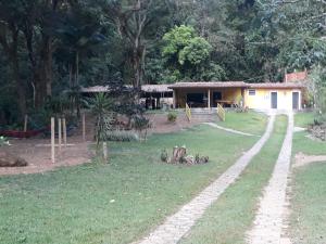 Domácí mazlíčci ubytovaní s hosty v ubytování Eco Parque Cachoeira Moxafongo