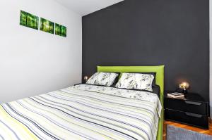 Posteľ alebo postele v izbe v ubytovaní Apartment Cave