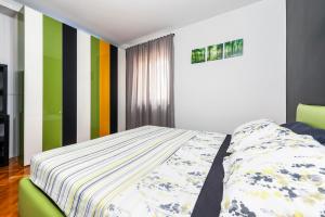 Posteľ alebo postele v izbe v ubytovaní Apartment Cave