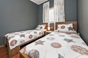 Posteľ alebo postele v izbe v ubytovaní Apartment Cave