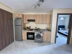 A cozinha ou cozinha compacta de APPART SMIR PARK