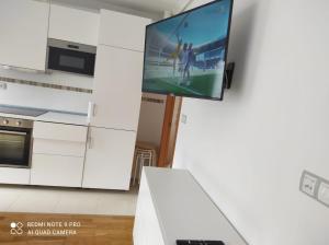 Kuchyň nebo kuchyňský kout v ubytování Brisalinda barreiros