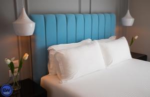 Postel nebo postele na pokoji v ubytování Blue Water Hotel Ksamil