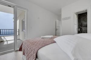 Postel nebo postele na pokoji v ubytování Villa Pejic NEW, PENTHOUSE