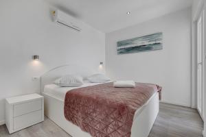Postel nebo postele na pokoji v ubytování Villa Pejic NEW, PENTHOUSE
