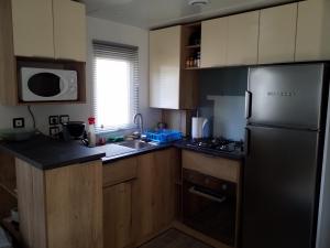 Mobilhomes Quiberon Camping Conguel - Bord de Mer 주방 또는 간이 주방