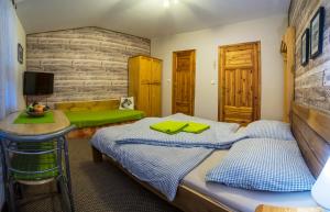 Postel nebo postele na pokoji v ubytování Apartmany Jasna Veverica