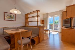 Kuchyň nebo kuchyňský kout v ubytování Residence Neuhäuslhof