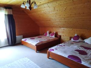 A bed or beds in a room at Purgaiļi