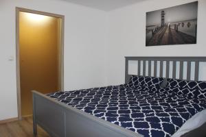 Postel nebo postele na pokoji v ubytování AAR Nordsee Appartement