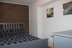 Postel nebo postele na pokoji v ubytování AAR Nordsee Appartement