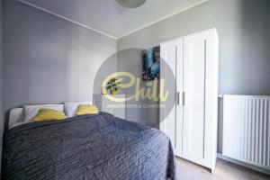 Postel nebo postele na pokoji v ubytování Chill Apartments City Link
