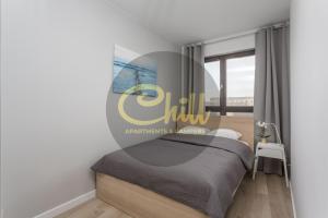 Postel nebo postele na pokoji v ubytování Chill Apartments City Link