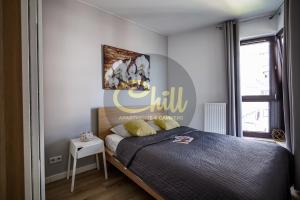 Postel nebo postele na pokoji v ubytování Chill Apartments City Link