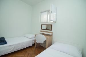 Postel nebo postele na pokoji v ubytování Villa Garina 1
