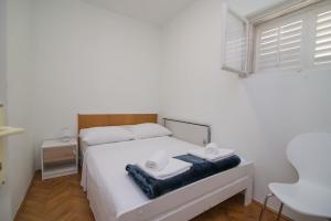 Postel nebo postele na pokoji v ubytování Villa Garina 1