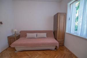 Postel nebo postele na pokoji v ubytování Villa Garina 1