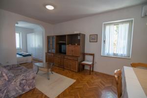 TV a/nebo společenská místnost v ubytování Villa Garina 1