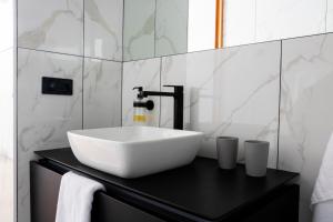 Koupelna v ubytování De 6 Linden Boutique Hotel