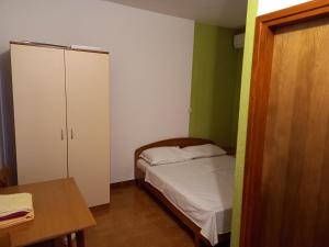 Postel nebo postele na pokoji v ubytování Astra apartman