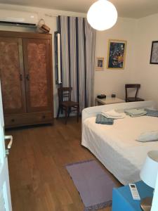 Łóżko lub łóżka w pokoju w obiekcie Rustic Holiday Home Miketa