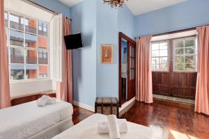 A bed or beds in a room at Apto El balcón de la Catedral