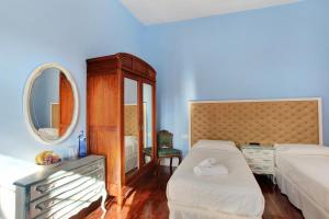 A bed or beds in a room at Apto El balcón de la Catedral