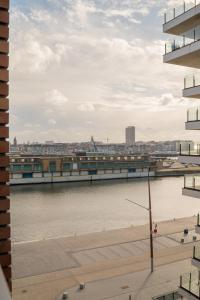 a view of a body of water from a building at Ostend Port Side incl parking in Ostend