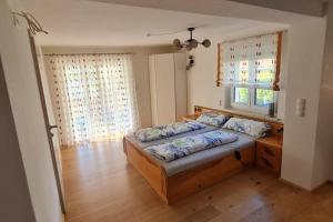 Postel nebo postele na pokoji v ubytování Apartment Bernd - Schöne Ferienwohnung am Rande von Ligist