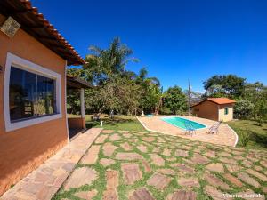 Bazén v ubytování Pousada Eldorado Das Gerais nebo v jeho okolí