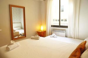 Posteľ alebo postele v izbe v ubytovaní Bcn-rentals apartments in the Old town