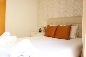 Posteľ alebo postele v izbe v ubytovaní Bcn-rentals apartments in the Old town