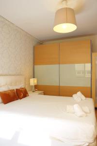 Posteľ alebo postele v izbe v ubytovaní Bcn-rentals apartments in the Old town
