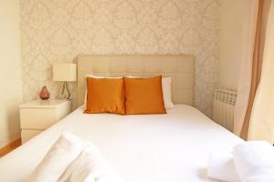 Posteľ alebo postele v izbe v ubytovaní Bcn-rentals apartments in the Old town