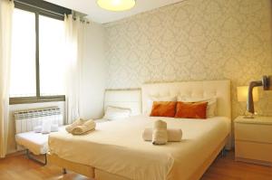 Posteľ alebo postele v izbe v ubytovaní Bcn-rentals apartments in the Old town