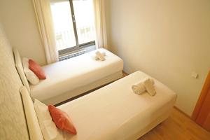 Posteľ alebo postele v izbe v ubytovaní Bcn-rentals apartments in the Old town