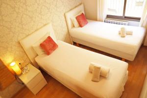 Posteľ alebo postele v izbe v ubytovaní Bcn-rentals apartments in the Old town