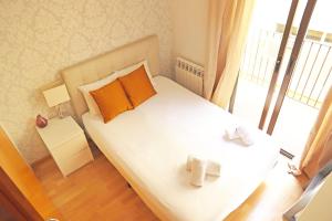 Posteľ alebo postele v izbe v ubytovaní Bcn-rentals apartments in the Old town