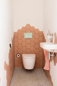 Koupelna v ubytování De 6 Linden Boutique Hotel