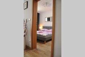 Posteľ alebo postele v izbe v ubytovaní Apartmány U Jelena 2