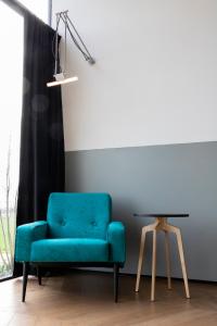 Posezení v ubytování De 6 Linden Boutique Hotel