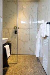 Koupelna v ubytování De 6 Linden Boutique Hotel